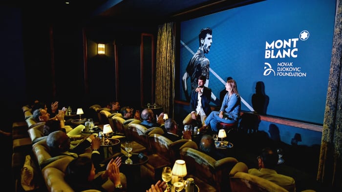 Novak Djokovic discusses a special-edition Montblanc pen at a private screening room in Chelsea.